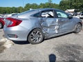 2018 Honda Civic — photo 6 of 15 | VIN 19XFC2F73JE008135