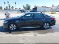 2017 Kia Optima Hybrid — photo 14 of 16 | VIN KNAGU4LC1H5005218