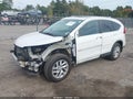 2015 Honda CR-V — photo 2 of 16 | VIN 5J6RM4H73FL130389