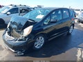 2011 Honda Fit — photo 2 of 18 | VIN JHMGE8H50BC017928