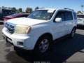 2011 Honda Pilot — photo 2 of 16 | VIN 5FNYF4H59BB009941