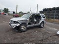 2009 Ford Escape — photo 2 of 16 | VIN 1FMCU93749KA43378