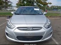 2017 Hyundai Accent — photo 12 of 16 | VIN KMHCT4AE9HU213695