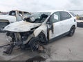 2020 Chevrolet Equinox — photo 2 of 16 | VIN 3GNAXHEV9LS734580