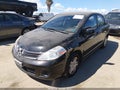 2011 Nissan Versa — photo 2 of 15 | VIN 3N1BC1AP3BL380767