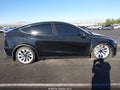 2026 Tesla Model Y — photo 13 of 16 | VIN 7SAYGDED2TA492702