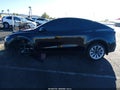 2026 Tesla Model Y — photo 14 of 16 | VIN 7SAYGDED2TA492702