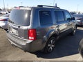 2012 Honda Pilot — photo 4 of 20 | VIN 5FNYF3H98CB013137