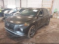 2022 Hyundai Tucson — photo 2 of 16 | VIN 5NMJFCAE1NH157803