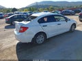2012 Honda Civic — photo 4 of 15 | VIN 2HGFB2F5XCH562038