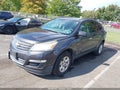 2014 Chevrolet Traverse — photo 2 of 11 | VIN 1GNKRFED4EJ159187
