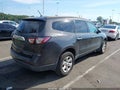 2014 Chevrolet Traverse — photo 4 of 11 | VIN 1GNKRFED4EJ159187