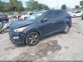 2013 Hyundai Santa Fe — photo 2 of 16 | VIN 5XYZU3LA3DG082534