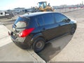 2011 Nissan Versa — photo 4 of 17 | VIN 3N1BC1CPXBL515496