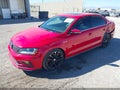 2018 Volkswagen Jetta — photo 2 of 16 | VIN 3VW4T7AJ8JM214559