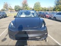 2024 Tesla Model Y — photo 11 of 18 | VIN 7SAYGDED6RF155266