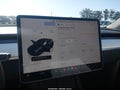 2024 Tesla Model Y — photo 17 of 18 | VIN 7SAYGDED6RF155266