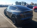 2024 Tesla Model Y — photo 18 of 18 | VIN 7SAYGDED6RF155266