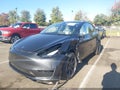 2024 Tesla Model Y — photo 6 of 18 | VIN 7SAYGDED6RF155266