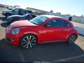 2013 Volkswagen Beetle — photo 14 of 16 | VIN 3VWVA7AT3DM607384