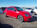 2013 Volkswagen Beetle — photo 1 of 16 | VIN 3VWVA7AT3DM607384