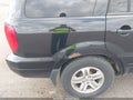 2005 Honda Pilot — photo 14 of 17 | VIN 5FNYF18505B038439