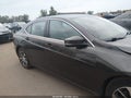 2015 Acura TLX — photo 14 of 17 | VIN 19UUB1F38FA006068