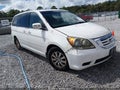 2009 Honda Odyssey — photo 1 of 16 | VIN 5FNRL38669B406355