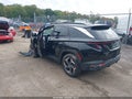 2022 Hyundai Tucson — photo 3 of 17 | VIN 5NMJFCAE0NH012266
