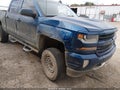 2018 Chevrolet Silverado 1500 — photo 6 of 16 | VIN 3GCUKREC3JG133268