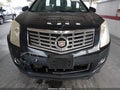 2014 Cadillac SRX — photo 12 of 16 | VIN 3GYFNDE33ES614685