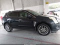 2014 Cadillac SRX — photo 13 of 16 | VIN 3GYFNDE33ES614685