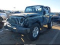2015 Jeep Wrangler — photo 2 of 12 | VIN 1C4AJWAG4FL613519
