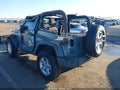 2015 Jeep Wrangler — photo 3 of 12 | VIN 1C4AJWAG4FL613519