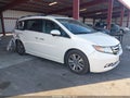 2014 Honda Odyssey — photo 1 of 19 | VIN 5FNRL5H98EB038616