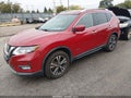 2017 Nissan Rogue — photo 2 of 16 | VIN 5N1ET2MVXHC831204