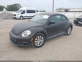 2016 Volkswagen Beetle — photo 2 of 17 | VIN 3VWF17AT4GM610352