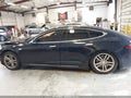 2013 Tesla Model S — photo 13 of 15 | VIN 5YJSA1DN4DFP04517