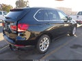 2015 BMW X5 — photo 4 of 16 | VIN 5UXKR0C59F0K64637