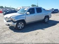 2013 Honda Ridgeline — photo 2 of 17 | VIN 5FPYK1F54DB019039