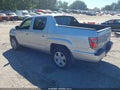 2013 Honda Ridgeline — photo 3 of 17 | VIN 5FPYK1F54DB019039
