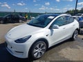 2022 Tesla Model Y — photo 2 of 22 | VIN 7SAYGDEEXNF457386
