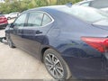 2016 Acura TLX — photo 14 of 16 | VIN 19UUB2F54GA004598