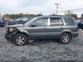 2007 Honda Pilot — photo 14 of 17 | VIN 2HKYF18707H502450