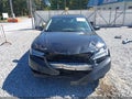2015 Acura TLX — photo 13 of 17 | VIN 19UUB2F59FA014820