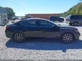 2015 Acura TLX — photo 14 of 17 | VIN 19UUB2F59FA014820