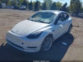 2024 Tesla Model Y — photo 2 of 16 | VIN 7SAYGDEE0RA285632