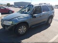 2006 Mercury Mariner — photo 2 of 17 | VIN 4M2YU57106DJ00565