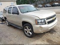 2012 Chevrolet Suburban 1500 — photo 1 of 17 | VIN 1GNSKJE71CR155629
