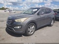 2013 Hyundai Santa Fe — photo 2 of 11 | VIN 5XYZU3LA7DG087431